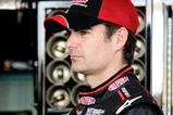 AVONDALE, AZ - NOVEMBER 13:  Jeff Gordon, driver of the #24 DuPont Chevrolet, stands in the garage during practice for the NASCAR Sprint Cup Series Checker O'Reilly Auto Parts 500 at Phoenix International Raceway on November 13, 2009 in Avondale, AZ.  (Photo by Jason Smith/Getty Images for NASCAR)