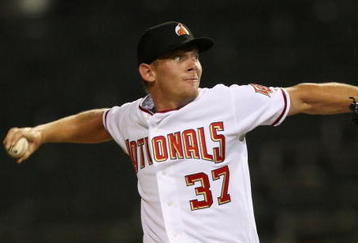 PHOENIX - OCTOBER 16:  Washington Nationals prospect Stephen Strasburg #37, playing for the Phoenix Desert Dogs, pitches in the Arizona Fall League game against the Scottsdale Scorpions at Phoenix Municipal Stadium on October 16, 2009 in Phoenix, Arizona.  (Photo by Christian Petersen/Getty Images)