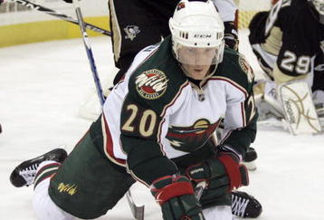 PITTSBURGH, PA - OCTOBER 31:  Antti Miettinen #20 of the Minnesota Wild handles the puck from his knees against the Pittsburgh Penguins in the second period at Mellon Arena on October 31, 2009 in Pittsburgh, Pennsylvania.  (Photo by Justin K. Aller/Getty Images)