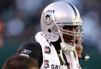 OAKLAND, CA - NOVEMBER 15:  JaMarcus Russell #2 of the Oakland Raiders stands on the sidelines after being taken out of their game against the Kansas City Chiefs at Oakland-Alameda County Coliseum on November 15, 2009 in Oakland, California.  (Photo by Ezra Shaw/Getty Images)