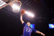 INDIANAPOLIS - MARCH 27:  Brady Morningstar #12 of the Kansas Jayhawks dunks against the Michigan State Spartans during the third round of the NCAA Division I Men's Basketball Tournament at the Lucas Oil Stadium on March 27, 2009 in Indianapolis, Indiana.  (Photo by Andy Lyons/Getty Images)