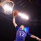 INDIANAPOLIS - MARCH 27: Brady Morningstar #12 of the Kansas Jayhawks dunks against the Michigan State Spartans during the third round of the NCAA Division I Men's Basketball Tournament at the Lucas Oil Stadium on March 27, 2009 in Indianapolis, Indiana. (Photo by Andy Lyons/Getty Images)
