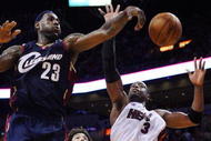 MIAMI - DECEMBER 30: Dwyane Wade #3 of the Miami Heat has a shot attempt blocked by LeBron James #23 of the Cleveland Cavaliers at American Airlines Arena on December 30, 2008 in Miami, Florida. The Heat defeated the Cavaliers 104-95. NOTE TO USER: User expressly acknowledges and agrees that, by downloading and/or using this Photograph, user is consenting to the terms and conditions of the Getty Images License Agreement. (Photo by Doug Benc/Getty Images)