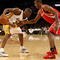 LOS ANGELES - NOVEMBER 15:  Kobe Bryant #24 of the Los Angeles Lakers controls the ball against Trevor Ariza #1 of the Houston Rockets on November 15, 2009 at Staples Center in Los Angeles, California.  The Rockets won 101-91.  NOTE TO USER: User expressly acknowledges and agrees that, by downloading and/or using this Photograph, user is consenting to the terms and conditions of the Getty Images License Agreement.   (Photo by Stephen Dunn/Getty Images)