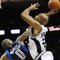 SAN ANTONIO - NOVEMBER 11:  Shawn Marion #0 of the Dallas Mavericks fouls Richard Jefferson #24 of the San Antonio Spurs in the act of shooting during second quarter of action at AT&T Center on November 11, 2009 in San Antonio, Texas.  NOTE TO USER: User expressly acknowledges and agrees that, by downloading and or using this photograph, User is consenting to the terms and conditions of the Getty Images License Agreement. (Photo by Ronald Martinez/Getty Images)