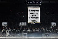 PITTSBURGH - OCTOBER 2: The Pittsburgh Penguins raise their Stanley Cup Champions banner in a ceremony before a game against the New York Rangers on October 2, 2009 at Mellon Arena in Pittsburgh, Pennsylvania. Pittsburgh defeated New York 3-2.  (Photo by Jamie Sabau/Getty Images)