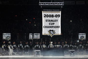 PITTSBURGH - OCTOBER 2: The Pittsburgh Penguins raise their Stanley Cup Champions banner in a ceremony before a game against the New York Rangers on October 2, 2009 at Mellon Arena in Pittsburgh, Pennsylvania. Pittsburgh defeated New York 3-2.  (Photo by Jamie Sabau/Getty Images)