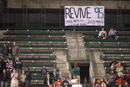 SEATTLE - AUGUST 25:  Fans watch from the left field bleachers during the game between the Seattle Mariners and the Oakland Athletics on August 25, 2009 at Safeco Field in Seattle, Washington. (Photo by Otto Greule Jr/Getty Images)