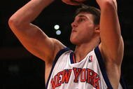 NEW YORK - OCTOBER 31:  Danilo Gallinari #8 of the New York Knicks shoots against the Philadelphia 76ers at Madison Square Garden on October 31, 2009 in New York City. The 76ers defeated the Knicks 141-127. NOTE TO USER: User expressly acknowledges and agrees that, by downloading and or using this photograph, User is consenting to the terms and conditions of the Getty Images License Agreement.  (Photo by Chris Trotman/Getty Images)