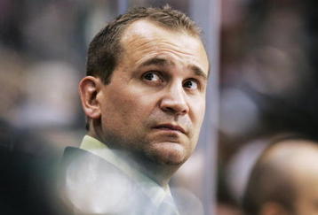 ST. PAUL, MN - SEPTEMBER 24: Todd Richards, head coach of the Minnesota Wild, looks on during their preseason game against the St. Louis Blues at the Xcel Energy Center on September 24, 2009 in St. Paul, Minnesota.  (Photo by Genevieve Ross/Getty Images) 