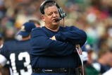 SOUTH BEND, IN - OCTOBER 03: Head coach Charlie Weis of the Notre Dame Fighting Irish watches as his team takes on the Washington Huskies on October 3, 2009 at Notre Dame Stadium in South Bend, Indiana.  Notre Dame defeated Washington 37-30 in overtime.  (Photo by Jonathan Daniel/Getty Images)
