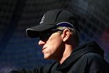 PHILADELPHIA - OCTOBER 08:  Manager Jim Tracy of the Colorado Rockies looks on during batting practice prior to Game Two of the NLDS against the Philadelphia Phillies during the 2009 MLB Playoffs at Citizens Bank Park on October 8, 2009 in Philadelphia, Pennsylvania.  (Photo by Chris McGrath/Getty Images)