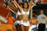 MIAMI - AUGUST 22:  Cheerleaders perform during a stoppage in play as the Carolina Panthers take on the Miami Dolphins during a pre-season game at Land Shark Stadium on August 22, 2009 in Miami, Florida. The Dolphins defeated the Panthers 27-17.  (Photo by Doug Benc/Getty Images)