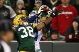 GREEN BAY, WI - NOVEMBER 15: Roy Williams #11 of the Dallas Cowboys catches a 4th quarter touchdown pass as Tramon Williams #38 of the Green Bay Packers defends at Lambeau Field on November 15, 2009 in Green Bay, Wisconsin. The Packers defeated the Cowboys 17-7. (Photo by Jonathan Daniel/Getty Images)