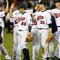 MINNEAPOLIS, MN- SEPTEMBER 28: Nick Punto #8, Brendan Harris #23, Justin Morneau #33 and Joe Nathan #36 of the Minnesota Twins celebrate after beating the Kansas City Royals 6-0 at the Metrodome on September 28, 2008 in Minneapolis, Minnesota. (Photo by Scott A. Schneider/Getty Images)