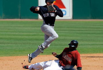 KISSIMMEE, FL - MARCH 02:  Reggie Abercrombie #1 of the Houston Astros slides into second base as Cody Ransom #12 of the New York Yankees tries to turn the double play during a spring training game at Osceola County Stadium on March 2, 2009 in Kissimmee, Florida.  (Photo by Sam Greenwood/Getty Images)