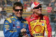 AVONDALE, AZ - NOVEMBER 15:  Jamie McMurray (L), driver of the #26 Irwin Ford, talks wtih Kevin Harvick (R), driver of the #29 Shell/Pennzoil Chevrolet, before the NASCAR Sprint Cup Series Checker O'Reilly Auto Parts 500 at Phoenix International Raceway on November 15, 2009 in Avondale, Arizona.  (Photo by Todd Warshaw/Getty Images for NASCAR)