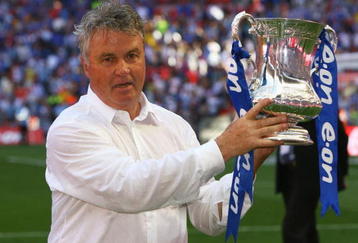 LONDON, ENGLAND - MAY 30:  Chelsea Manager Guus Hiddink lifts the trophy after the FA Cup sponsored by E.ON Final match between Chelsea and Everton at Wembley Stadium on May 30, 2009 in London, England.  (Photo by Alex Livesey/Getty Images)
