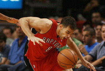 MIAMI - MARCH 05:  Jose Calderon #8 of the Toronto Raptors steals the ball on the sideline against the Miami Heat at American Airlines Arena on March 5,  2008 in Miami, Florida.  NOTE TO USER: User expressly acknowledges and agrees that, by downloading and or using this photograph, User is consenting to the terms and conditions of the Getty Images License Agreement.  (Photo by Doug Benc/Getty Images)