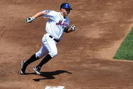 NEW YORK - JULY 12: David Wright #5 of the New York Mets scores a run in the third inning against the Cincinnati Reds on July 12, 2009 at Citi Field in the Flushing neighborhood of the Queens borough of New York City. (Photo by Jim McIsaac/Getty Images)