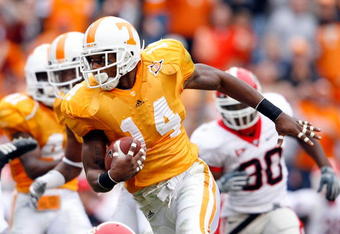 KNOXVILLE, TN - OCTOBER 10: Eric Berry #14 of the Tennessee Volunteers runs with the ball after intercepting a pass during the SEC game against the Georgia Bulldogs at Neyland Stadium on October 10, 2009 in Knoxville, Tennessee. (Photo by Andy Lyons/Getty Images)