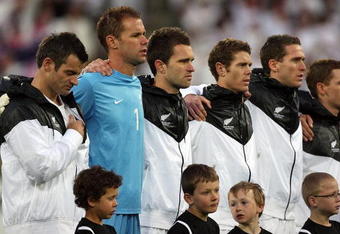 WELLINGTON, NEW ZEALAND - NOVEMBER 14:  The All Whites line up for the national anthem before the FIFA World Cup Asian Qualifying match between New Zealand and Bahrain at Westpac Stadium on November 14, 2009 in Wellington, New Zealand.  (Photo by Hannah Johnston/Getty Images)