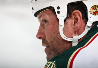 PHILADELPHIA - SEPTEMBER 29: Owen Nolan #11 of the Minnesota Wild stretches during warm ups prior to his game against the Philadelphia Flyers at the Wachovia Center on September 29, 2009 in Philadelphia, Pennsylvania.  (Photo by Bruce Bennett/Getty Images)