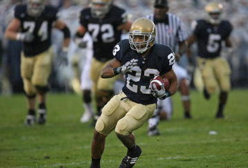 SOUTH BEND, IN - OCTOBER 03: Golden Tate #23 of the Notre Dame Fighting Irish runs against the Washington Huskies on his way to a 67 yard touchdown on October 3, 2009 at Notre Dame Stadium in South Bend, Indiana. (Photo by Jonathan Daniel/Getty Images)