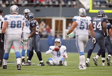 SEATTLE - NOVEMBER 08:  Quarterback Matthew Stafford #9 of the Detroit Lions on the ground after a play during the game against the Seattle Seahawks on November 8, 2009 at Qwest Field in Seattle, Washington. The Seahawks defeated the Lions 32-20. (Photo by Otto Greule Jr/Getty Images)