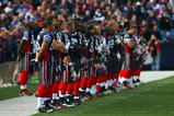 ORCHARD PARK, NY - NOVEMBER 01:  Buffalo Bills players stand for the National Anthem before the game against the Houston Texans at Ralph Wilson Stadium on November 1, 2009 in Orchard Park, New York. Houston won 31-10. (Photo by Rick Stewart/Getty Images)