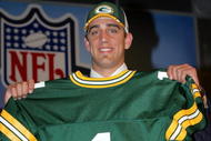 NEW YORK - APRIL 23: Quarterback Aaron Rodgers (California) poses with his jersey after being drafted 24th overall by the Green Bay Packers during the 70th NFL Draft on April 23, 2005 at the Jacob K. Javits Convention Center in New York City. (Photo by Chris Trotman/Getty Images)