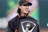 SAN FRANCISCO - APRIL 08:  Pitcher Tim Lincecum #55 of the San Francisco Giants celebrates after receiving his 2008 Cy Young award before his game against the Milwaukee Brewers at a Major League Baseball game on April 8, 2009 at AT&T Park in San Francisco, California.  (Photo by Jed Jacobsohn/Getty Images)