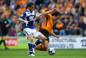 HULL, ENGLAND - SEPTEMBER 19:  Stephen Hunt of Hull City (R) in action with Barry Ferguson of Birmingham City during the Barclays Premier League match between Hull City and Birmingham City at the KC Stadium on September 19, 2009 in Hull, England.  (Photo by Clive Brunskill/Getty Images)