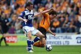 HULL, ENGLAND - SEPTEMBER 19:  Stephen Hunt of Hull City (R) in action with Barry Ferguson of Birmingham City during the Barclays Premier League match between Hull City and Birmingham City at the KC Stadium on September 19, 2009 in Hull, England.  (Photo by Clive Brunskill/Getty Images)