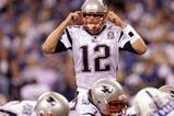 INDIANAPOLIS - NOVEMBER 15: Quarterback Tom Brady #12 of the New England Patriots calls a play in the fourth quarter of the game against the Indianapolis Colts at Lucas Oil Stadium on November 15, 2009 in Indianapolis, Indiana. The Colts won the game 35-34. (Photo by Jamie Squire/Getty Images)