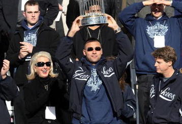NEW YORK - NOVEMBER 06:  Captain Derek Jeter #2 of the New York Yankees celebrates with the championship trophy during the New York Yankees World Series Victory Celebration at City Hall on November 6, 2009 in New York, New York.  (Photo by Jim McIsaac/Getty Images)
