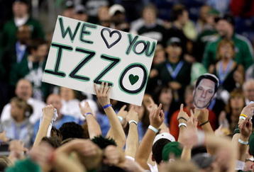 DETROIT - APRIL 06:  A fan of the Michigan State Spartans holds up a sign which reads 'We love you Izzo' in support of Michigan State head coach Tom Izzo against the North Carolina Tar Heels during the 2009 NCAA Division I Men's Basketball National Championship game at Ford Field on April 6, 2009 in Detroit, Michigan.  (Photo by Andy Lyons/Getty Images)