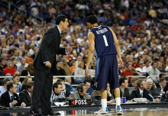 DETROIT - MARCH 28:  Head coach Jay Wright of the Villanova Wildcats talks with Scottie Reynolds against the Kansas Jayhawks during the Midwest Regional Semifinal of the 2008 NCAA Division I Men's Basketball Tournament at Ford Field on March 28, 2008 in Detroit, Michigan  (Photo by Gregory Shamus/Getty Images)