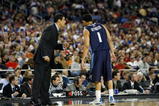 DETROIT - MARCH 28:  Head coach Jay Wright of the Villanova Wildcats talks with Scottie Reynolds against the Kansas Jayhawks during the Midwest Regional Semifinal of the 2008 NCAA Division I Men's Basketball Tournament at Ford Field on March 28, 2008 in Detroit, Michigan  (Photo by Gregory Shamus/Getty Images)