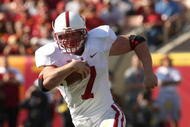 LOS ANGELES, CA - NOVEMBER 14:  Running back Toby Gerharrt #7 of the Stanford Cardinal  carries the ball against the USC Trojans on November 14, 2009 at the Los Angeles Coliseum in Los Angeles, California.  Stanford won 55-21.  (Photo by Stephen Dunn/Getty Images)