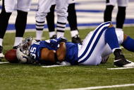 INDIANAPOLIS, IN - AUGUST 20: Running back Chad Simpson #35 of the Indianapolis Colts lays on the field injured against the Philadelphia Eagles at Lucas Oil Stadium on August 20, 2009 in Indianapolis, Indiana. (Photo by Scott Boehm/Getty Images)