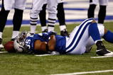 INDIANAPOLIS, IN - AUGUST 20: Running back Chad Simpson #35 of the Indianapolis Colts lays on the field injured against the Philadelphia Eagles at Lucas Oil Stadium on August 20, 2009 in Indianapolis, Indiana. (Photo by Scott Boehm/Getty Images)
