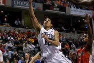 INDIANAPOLIS - MARCH 13: Talor Battle #12 of the Penn State Nittany Lions drives for a shot attempt against the Illinois Fighting Illini during the Big Ten Men's Basketball Tournament at Conseco Fieldhouse on March 13, 2008 in Indianapolis, Indiana. Illionis won 64-63. (Photo by Jonathan Daniel/Getty Images)