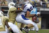 ORLANDO, FL - OCTOBER 20: Wide receiver Jesse Meyer #84 of the  Tulsa Golden Hurricane grabs a pass against the University of Central Florida Knights at Bright House Stadium on October 20, 2007 in Orlando, Florida.  UCF won 44 - 23. (Photo by Al Messerschmidt/Getty Images)