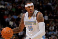 DENVER - OCTOBER 28:  Carmelo Anthony #15 of the Denver Nuggets dribbles the ball upcourt against the Utah Jazz during NBA action at Pepsi Center on October 28, 2009 in Denver, Colorado. The Nuggets defeated the Jazz 114-105.  (Photo by Doug Pensinger/Getty Images)