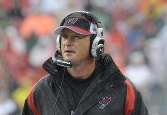TAMPA, FL - NOVEMBER 30:  Coach Jon Gruden of the Tampa Bay Buccaneers checks the scoreboard against the New Orleans Saints at Raymond James Stadium on November 30, 2008 in Tampa, Florida.  (Photo by Al Messerschmidt/Getty Images)