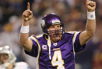 MINNEAPOLIS - NOVEMBER 15:  Brett Favre #4 of the Minnesota Vikings celebrates a touchdown in the fourth quarter against the Detroit Lions on November 15, 2009 at Hubert H. Humphrey Metrodome in Minneapolis, Minnesota. The Vikings defeated the Lions 27-10.  (Photo by Elsa/Getty Images)