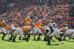 KNOXVILLE, TN - NOVEMBER 19:  Quarterback Rick Clausen #7 of the Tennessee Volunteers calls the audible at the line during the game against the Vanderbilt Commodores on November 19, 2005 at Neyland Stadium in Knoxville, Tennessee. Commodores defeated the Volunteers 28-24. (Photo by Doug Pensinger/Getty Images)
