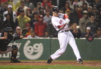 BOSTON - JUNE 11: Jason Bay #44 of the Boston Red Sox makes contact against the New York Yankees at Fenway Park on June 11, 2009 in Boston, Massachusetts.  (Photo by Jim Rogash/Getty Images)