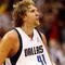 DALLAS - NOVEMBER 18:  Forward Dirk Nowitzki #41 of the Dallas Mavericks reacts after scoring in overtime against the San Antonio Spurs on November 18, 2009 at American Airlines Center in Dallas, Texas.  NOTE TO USER: User expressly acknowledges and agrees that, by downloading and/or using this Photograph, user is consenting to the terms and conditions of the Getty Images License Agreement.  (Photo by Ronald Martinez/Getty Images)
